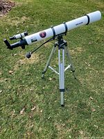 Full view of telescope on tripod, focuser end visible