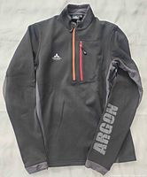 Vaude Argon jacket front view showing color, zippers, branding, sleeve graphic