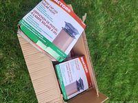 Closed carton showing product branding and small inner boxes