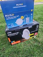 Front of Incarled box and Feit box showing product names and sizes