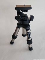 Full view of Slik Mini 8555 tripod extended