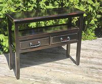 Full front and top view showing drawers and shelf