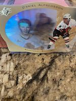 Front of SPx Gold Daniel Alfredsson card showing holographic design