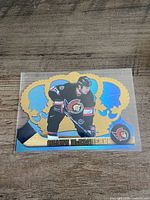 Front of 1998-99 Crown Royale Shawn McEachern die-cut foil hockey card