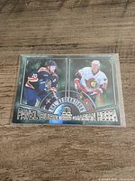Front of the 1999-00 Pacific Omega NHL Generations card showing Pavel Bure and Marian Hossa