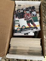 Open box showing large stack of Pro Set hockey cards