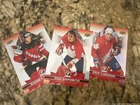 photo shows front of three Upper Deck Tim Hortons Team Canada hockey cards: Sidney Crosby, Phil Esposito, Eric Lindros
