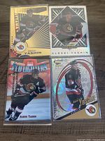 All four Alexei Yashin trading cards laid out