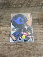Front of 1997-98 Paramount Alexei Yashin team checklist hockey card
