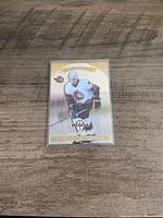 Alexei Yashin side of the card showing design details and condition