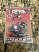 Front view of Upper Deck Tim Hortons Franchise Force Erik Karlsson hockey card in protective sleeve