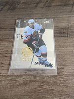 Front of Jason York Millennium Signature Series hockey card showing image, gold logo and 02/25 serial number