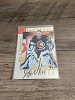 Front of autographed Ron Tugnutt card in sleeve