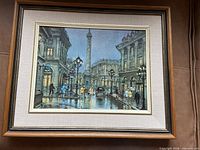 Front view of framed painting showing artwork, mat and frame detail