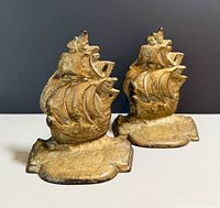 Front view of both brass sailing ship bookends