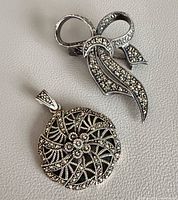 Brooch and pendant front view