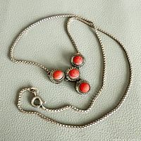 Full view of necklace showing chain, pendant and clasp