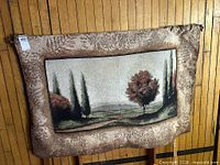 Front view of tapestry hanging on pole