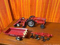 Overall view of tractor with three implements