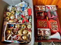 Overall view of two bins with loose and boxed ornaments