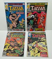 Front covers of all four bagged comics