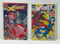 Front view of both bagged comics standing side by side