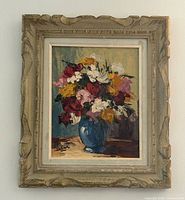 frontal view of framed still life oil painting