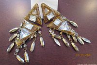 Pair of gold-tone glitter resin geometric dangle earrings with crystal drops