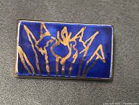front view showing cobalt blue enamel and gold design