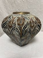 Front view showing overall shape and embossed floral pattern