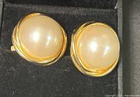 Pair of faux pearl gold tone clip-on earrings in box