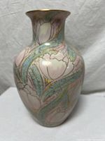 Front view showing floral motif and form