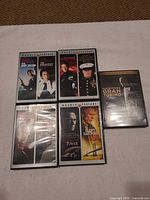 Front view of five DVD cases showing artwork and titles