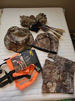 All items laid out showing variety of hunting gear