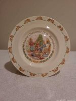 Front of Royal Doulton Bunnykins Christmas plate