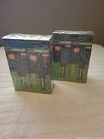 Two shrink-wrapped twin packs of camping lights