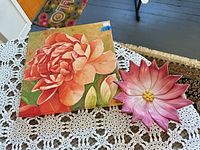 Canvas print and ceramic dish on table