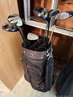 Bag with six clubs inside showing club heads