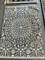 Full view of area rug showing pattern and color