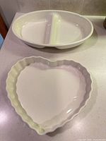 Heart-shaped dish front with divided bowl behind