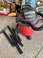 Full view of Craftsman shop vac with hose, three extension wands and floor nozzle
