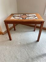Overall view of rectangular Trioh tile-top table
