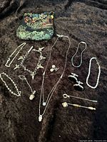 Full layout of all jewellery pieces and pouch