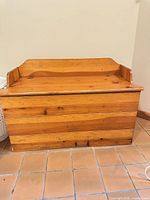 front view closed showing pine planks and backrest