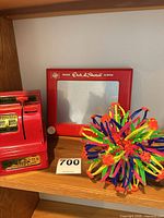 Shelf view showing all three toys together