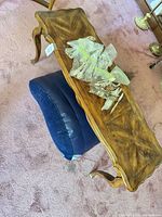 Angled view of entire console table showing top surface, legs, finish