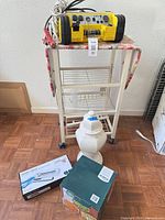 Overall view of power station on cart with urn below