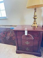 Nightstand front with lamp on top