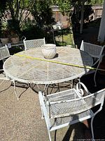 Full view of round table with four chairs
