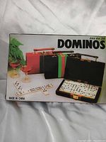 Retail box front showing domino set graphics